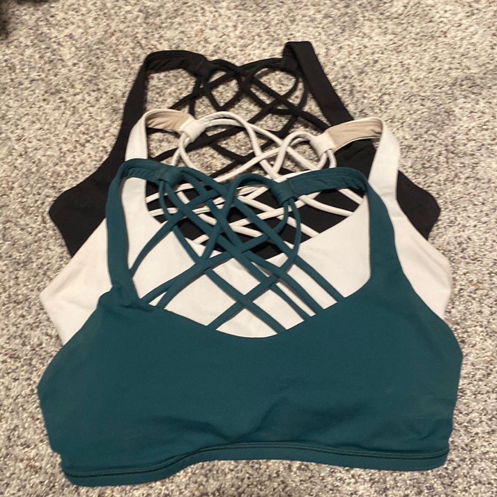 3 lululemon free to be wild bras in size 4